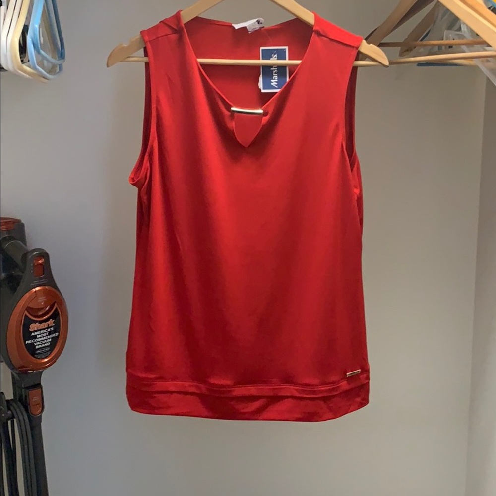 Red sleeveless blouse